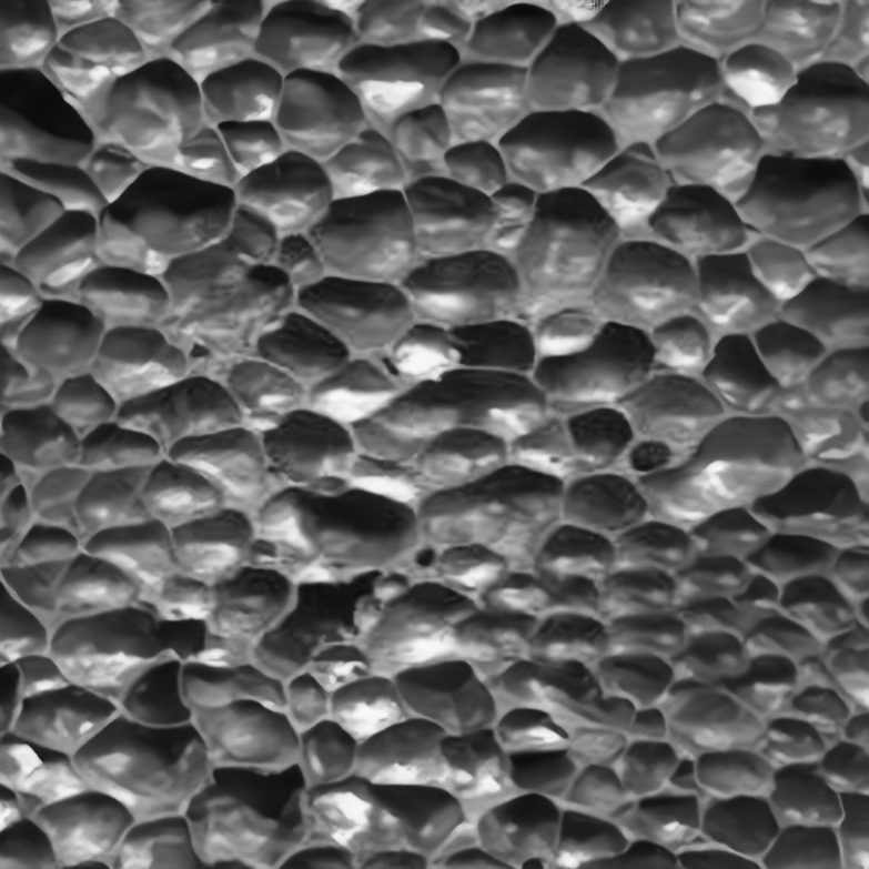 A microscopic photo of closed cell spray foam.