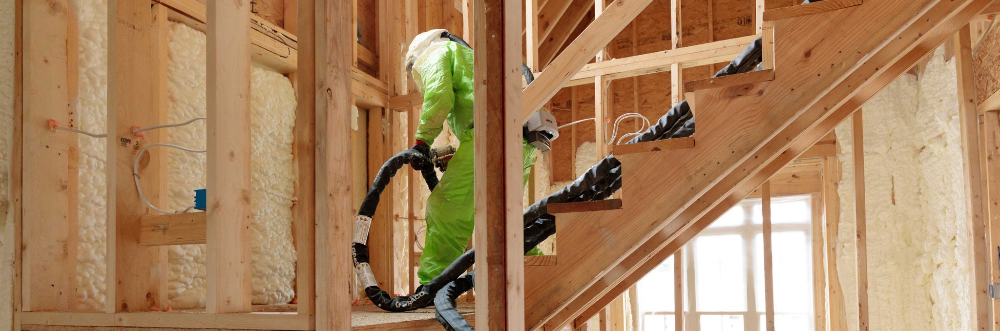 Spray foam installation in stairwell