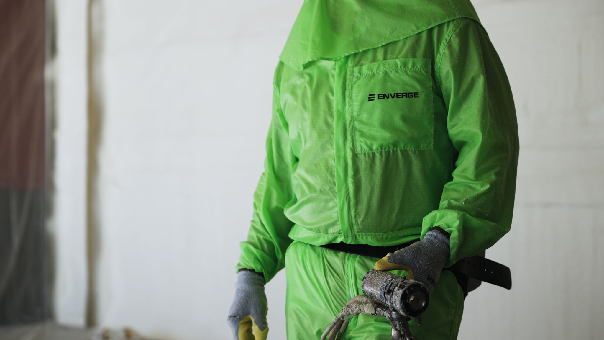 An enverge applicator wearing proper PPE